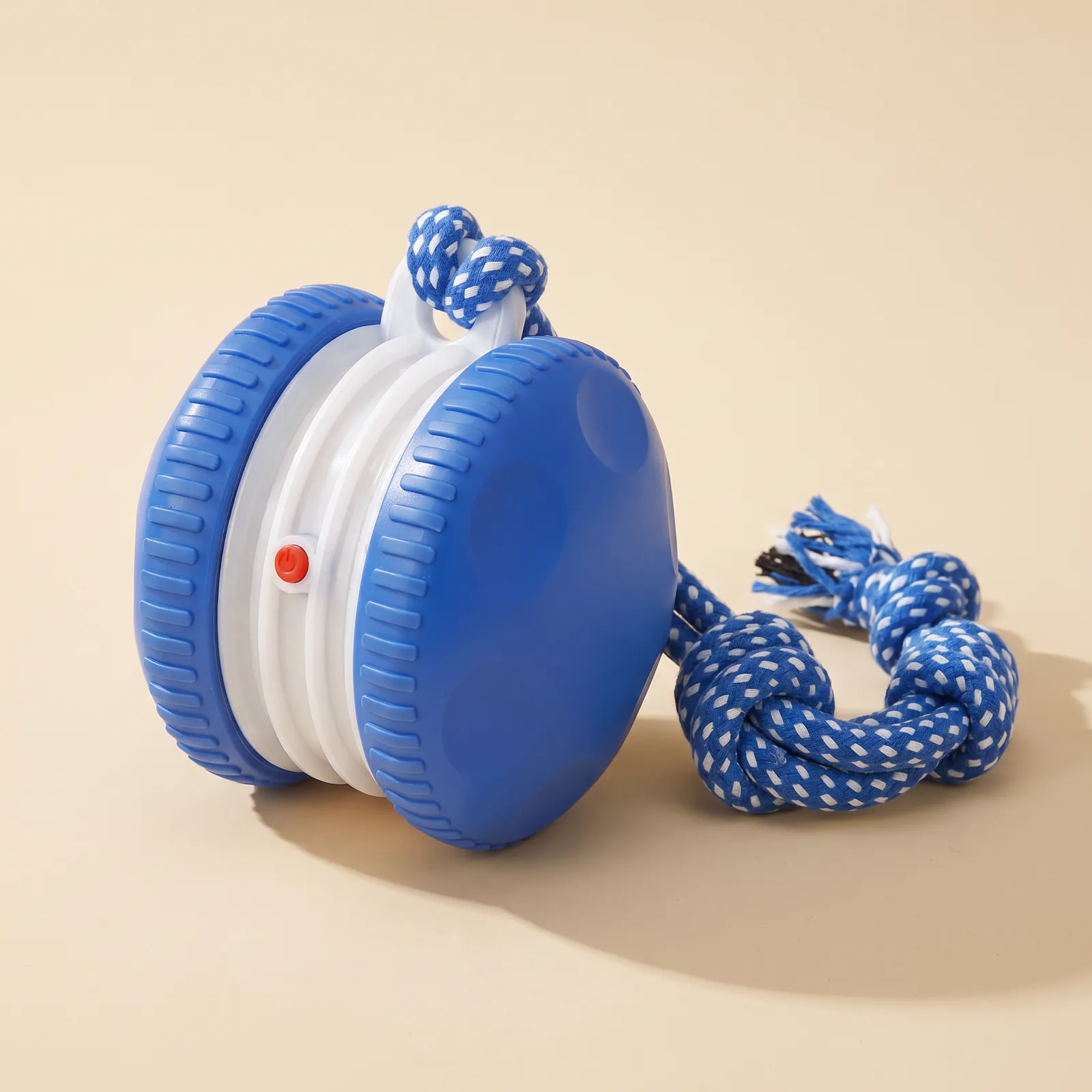 Blue rolling ball with blue and white rope